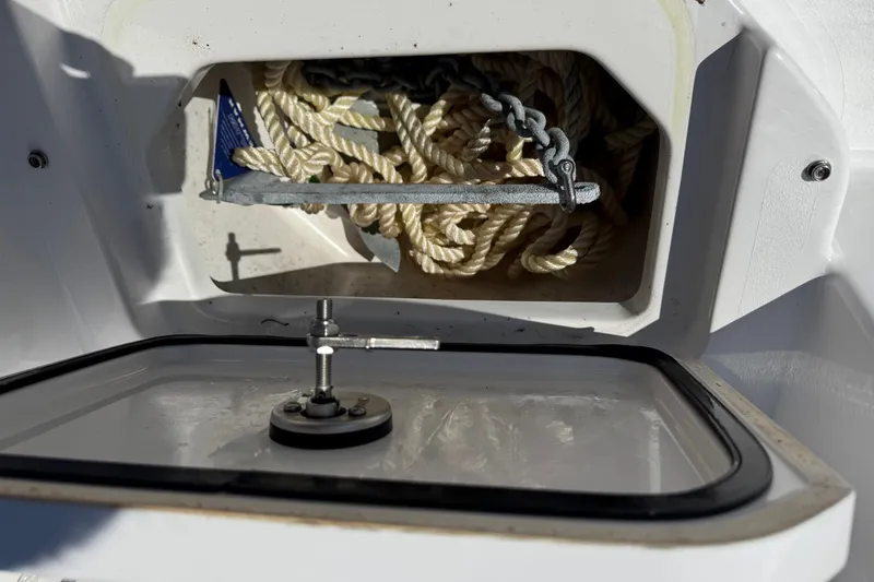 Slide: The Image of Anchor storage compartment on 2024 Sportsman Heritage 231 Center Console boat. - 6