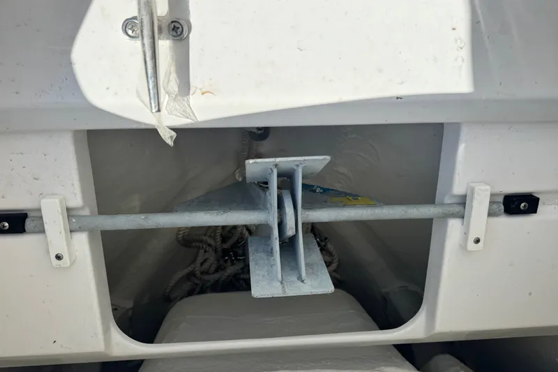 Slide: The Image of Anchor storage compartment on a 2024 Sportsman Heritage 231 Center Console boat. - 20