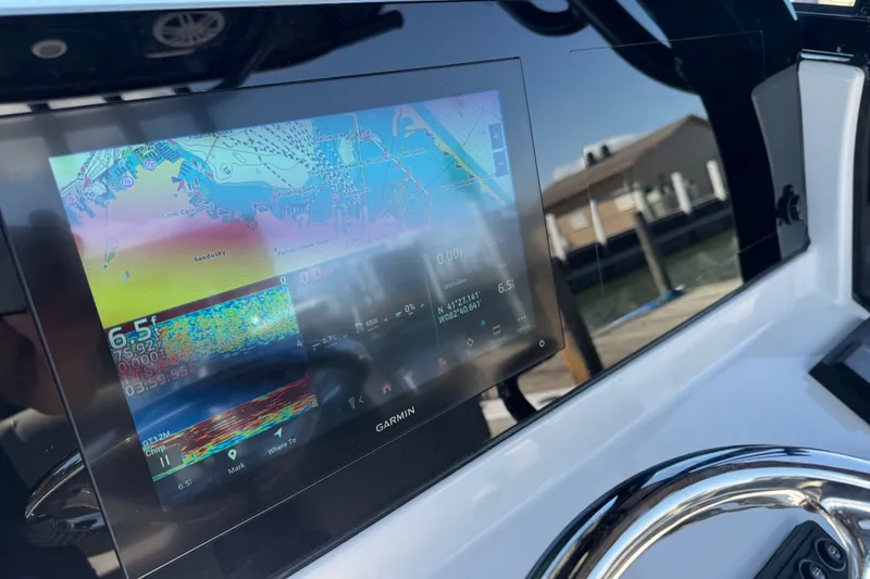 Slide: The Image of Garmin navigation display on 2024 Sportsman Heritage 231 Center Console boat. - 12