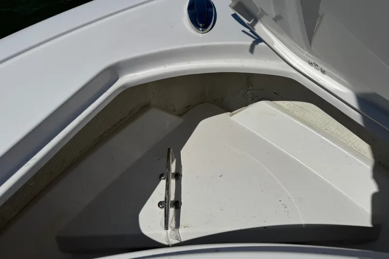Slide: The Image of Storage compartment of 2024 Sportsman Heritage 231 Center Console boat, open and empty. - 19