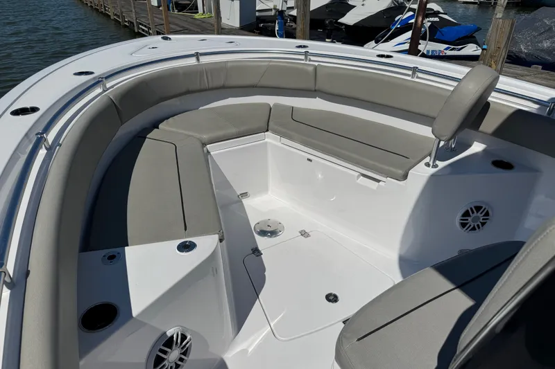 Slide: The Image of 2024 Sportsman Heritage 231 Center Console boat with spacious seating and modern design. - 15