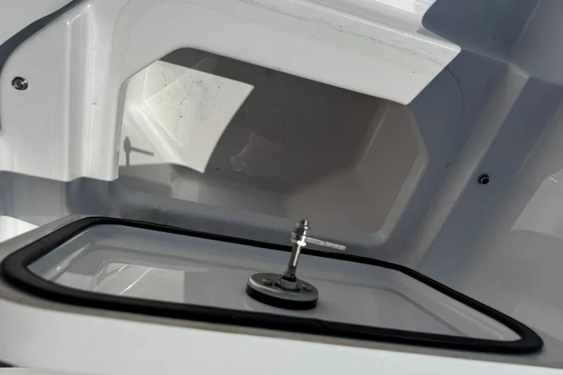 Slide: The Image of 2024 Sportsman Heritage 231 Center Console storage compartment detail. - 7