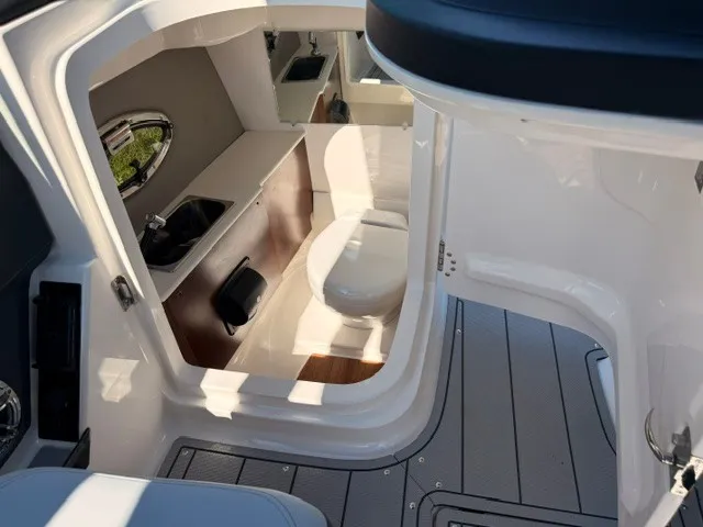 Slide: The Image of The image shows the interior of a boat with a toilet and a sink. - 5