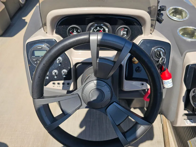 Slide: The Image of The image shows the helm of a 2019 Princecraft Vectra 21 with instruments and controls. - 10