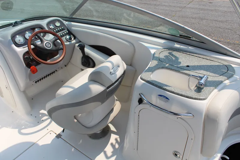 Slide: The Image of The image shows the cockpit of a 2007 Chaparral 246 SSi with a sleek dashboard and a sink. - 10
