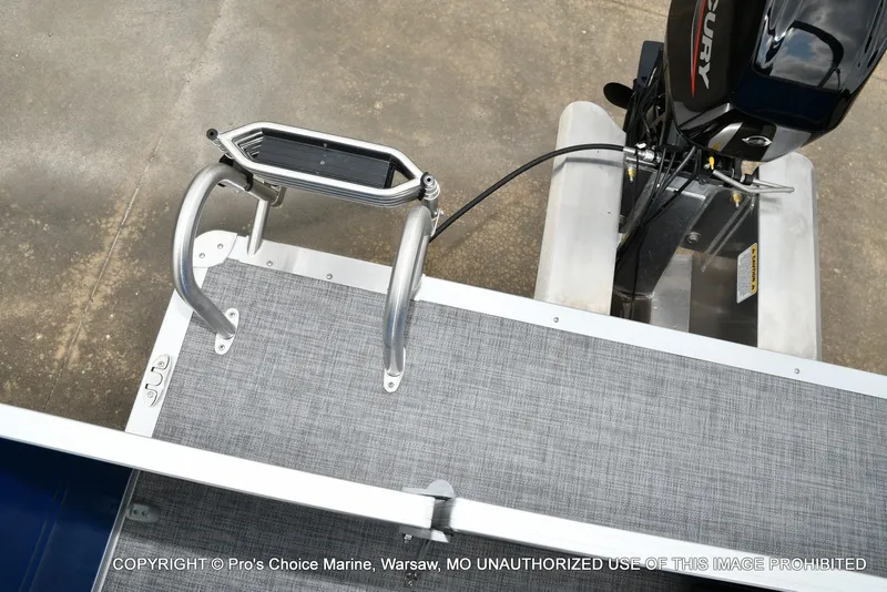 Slide: The Image of The image shows the stern of a Sun Tracker Party Barge 16 with a Mercury outboard motor. - 11