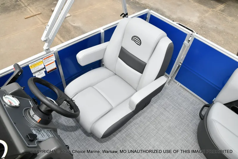 Slide: The Image of The image shows the seating area of a 2027 Sun Tracker Party Barge 16 with gray upholstery. - 5