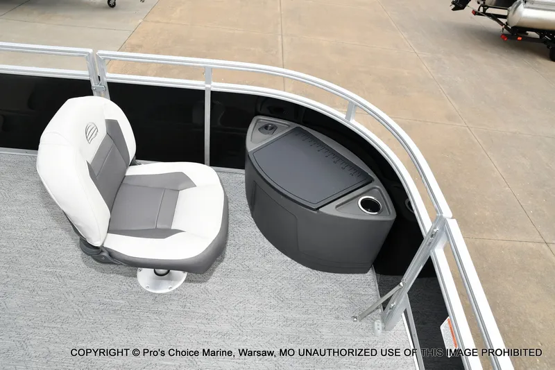 Slide: The Image of A seat and console on a Sun Tracker Fishin' Barge 20 DLX pontoon boat. - 5