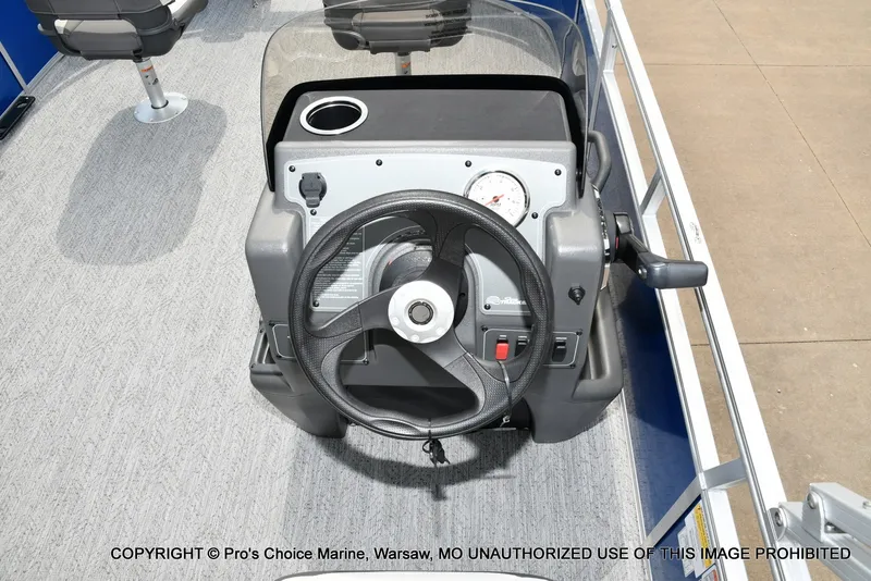 Slide: The Image of The image shows the helm of a 2027 Sun Tracker Bass Buggy 16 XL Select. - 11