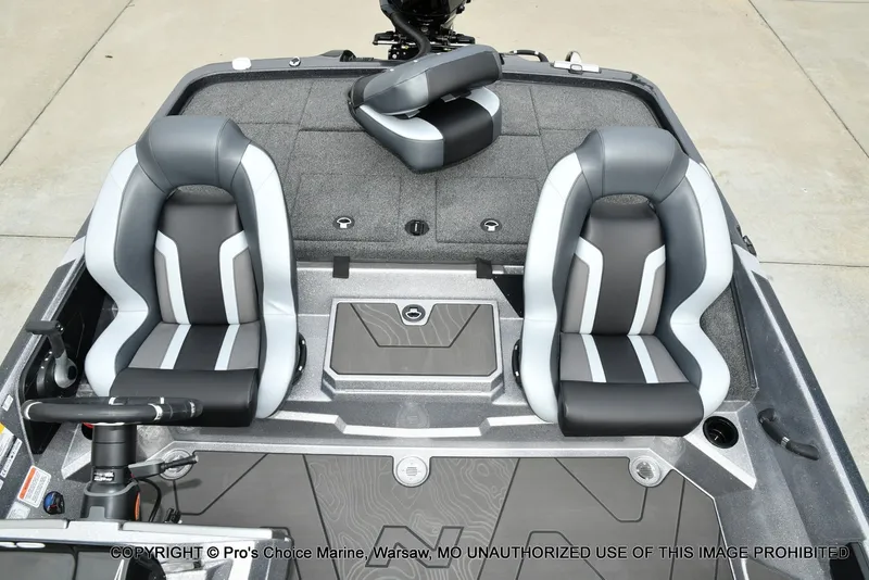 Slide: The Image of The image shows the cockpit of a Nitro Z19 XL Pro boat with two padded seats. - 22