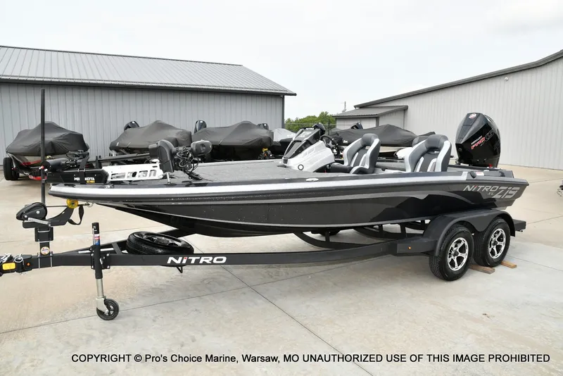 Slide: The Image of A modern 2027 Nitro Z19 XL Pro sits on a trailer in a storage area. - 31