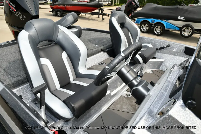 Slide: The Image of The image shows the interior of a Nitro Z19 XL Pro boat with two modern seats. - 11