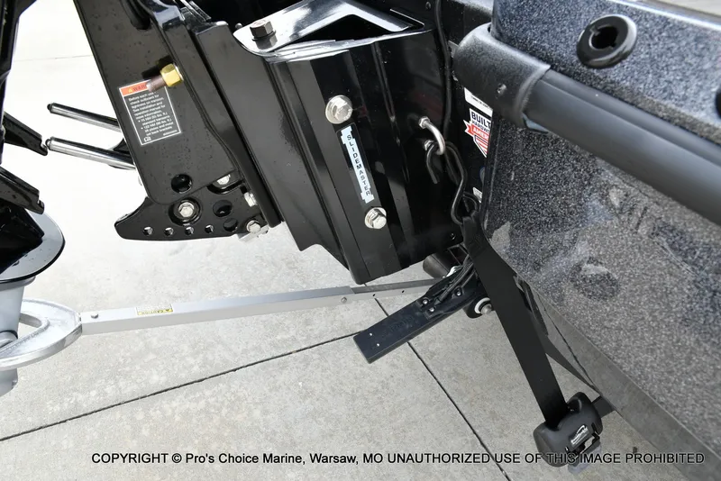 Slide: The Image of Close-up of a 2027 Nitro Z19 XL Pro boat's engine on a trailer. - 26