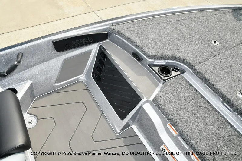 Slide: The Image of The image shows the deck of a Nitro Z19 XL Pro boat with gray carpeting and storage compartments. - 50