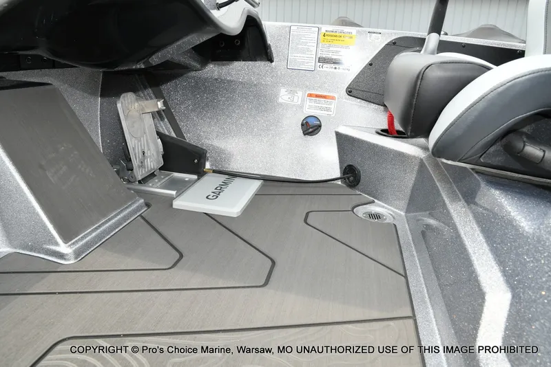 Slide: The Image of The image shows the interior of a Nitro Z19 XL Pro boat with Garmin equipment. - 48
