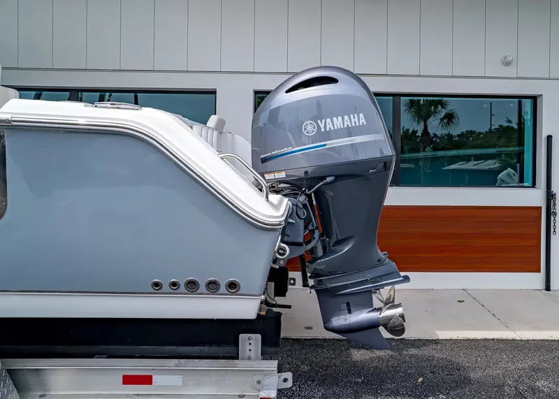 Slide: The Image of A Yamaha outboard motor is mounted on a 2020 Sea Hunt Gamefish 27CB boat. - 4
