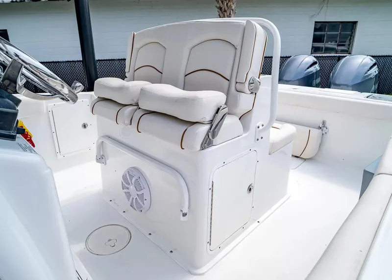 Slide: The Image of The 2020 Sea Hunt Gamefish 27CB features a cushioned double seat with an integrated speaker. - 23