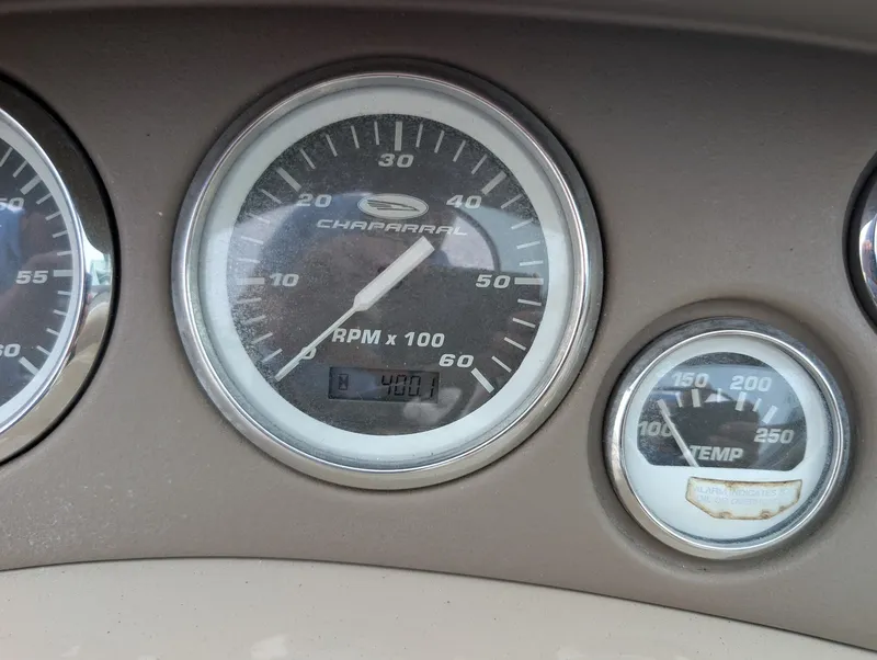 Slide: The Image of Close-up of boat instruments, including a tachometer and a temperature gauge. - 7