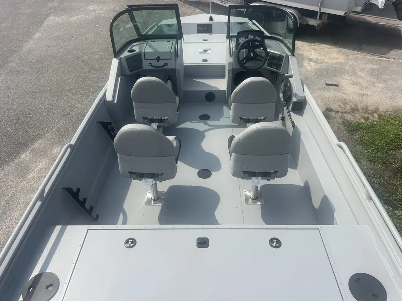 Slide: The Image of The image shows a 2027 G3 Sportsman 2100-CATFISH boat with four seats and a helm station. - 9