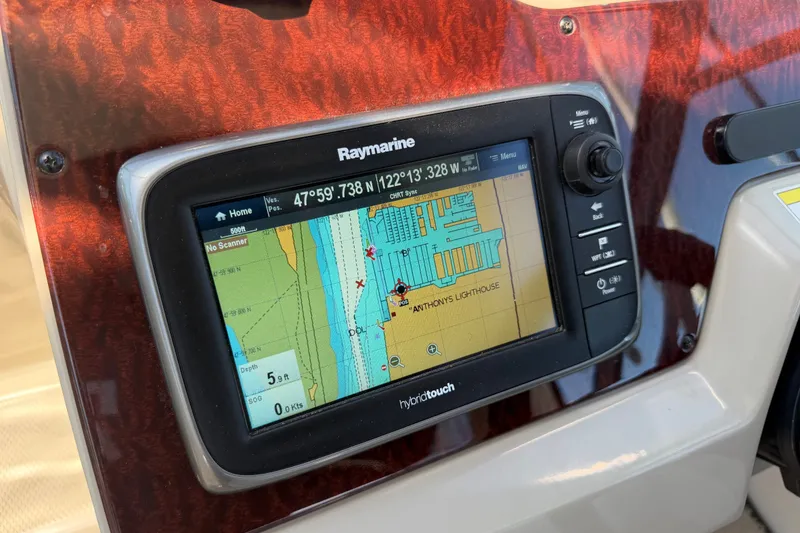 Slide: The Image of Raymarine GPS display on 2013 Sea Ray Sundancer 280, showing navigation map and coordinates. - 16