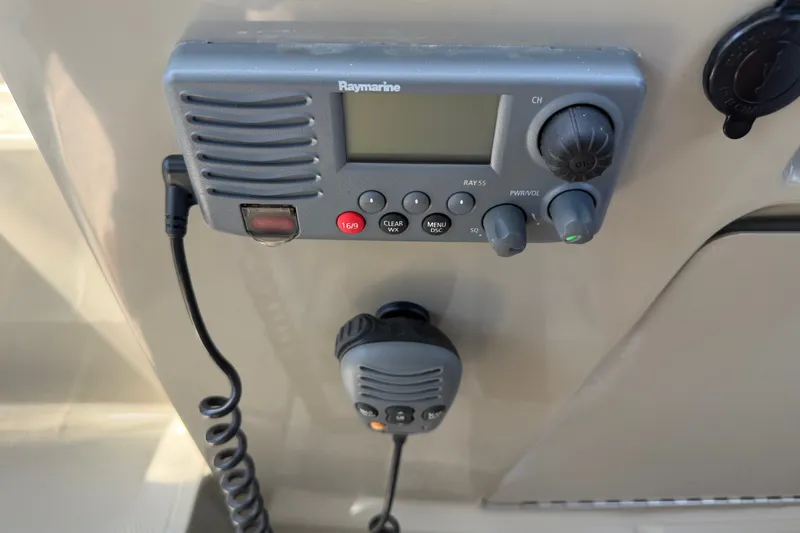 Slide: The Image of Raymarine radio system on 2013 Sea Ray Sundancer 280 boat dashboard. - 17