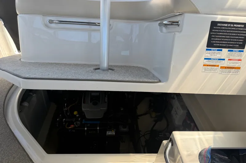 Slide: The Image of Engine compartment of a 2013 Sea Ray Sundancer 280 boat, showing maintenance area. - 41