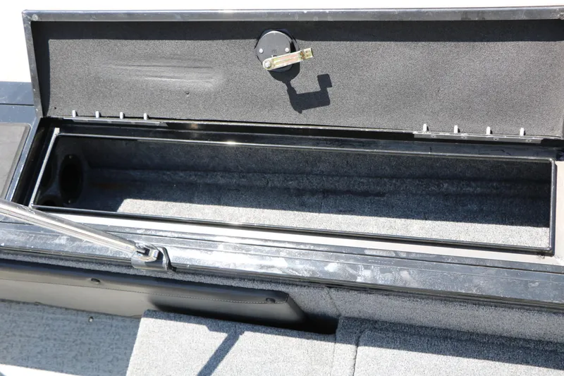 Slide: The Image of An open storage compartment on a 2020 Tracker Targa V 19 Combo boat. - 41