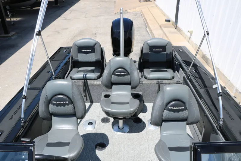 Slide: The Image of The image shows the cockpit of a 2020 Tracker Targa V 19 Combo with five gray seats. - 43