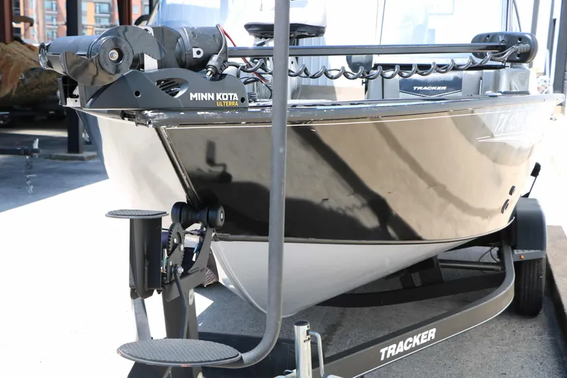 Slide: The Image of A 2020 Tracker Targa V 19 Combo on a trailer, equipped with a Minn Kota Ulterra motor. - 10