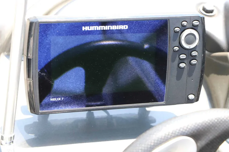 Slide: The Image of A Humminbird Helix 7 fish finder is mounted on a boat. - 33