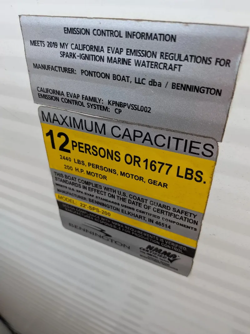 Slide: The Image of Label with emission and capacity information for a 2019 Bennington 23 SSRXP boat. - 15