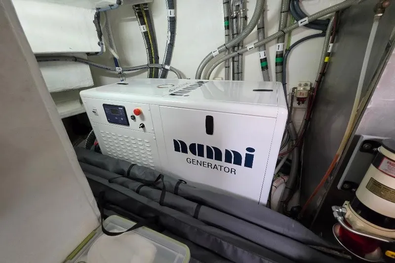 Slide: The Image of Engine room of 2024 Sirena 58 Flybridge MY with Nanni generator. - 127