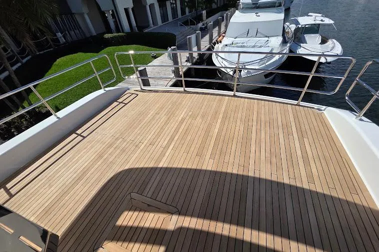 Slide: The Image of Spacious deck of 2024 Sirena 58 Flybridge MY yacht docked by the water. - 39