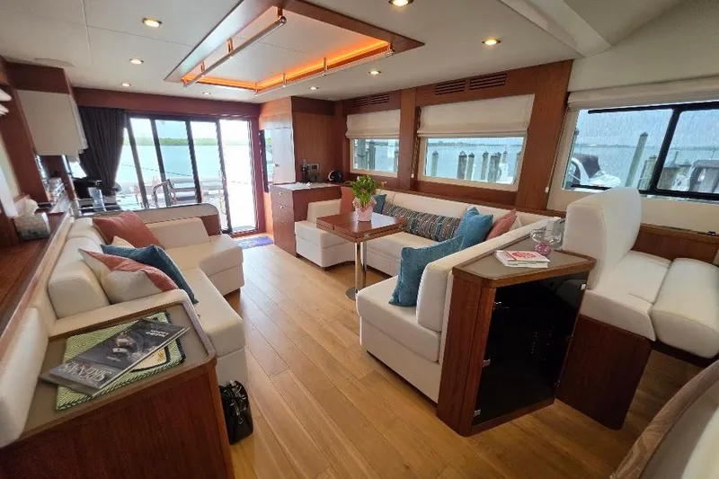 Slide: The Image of Luxurious interior of 2024 Sirena 58 Flybridge MY yacht with elegant seating and decor. - 78