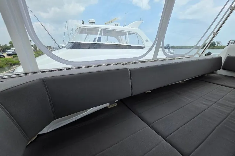 Slide: The Image of Luxurious interior of 2024 Sirena 58 Flybridge MY yacht with sleek seating and scenic view. - 45