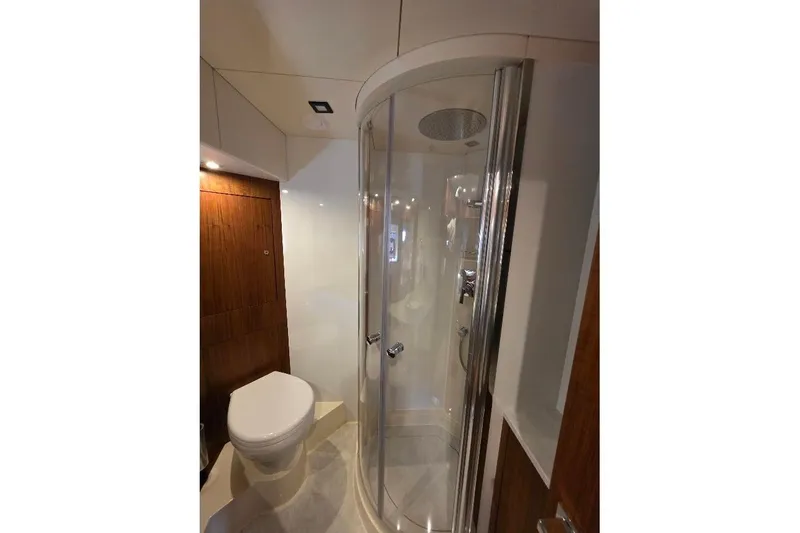 Slide: The Image of Luxurious bathroom in 2024 Sirena 58 Flybridge MY yacht with modern shower and toilet. - 108