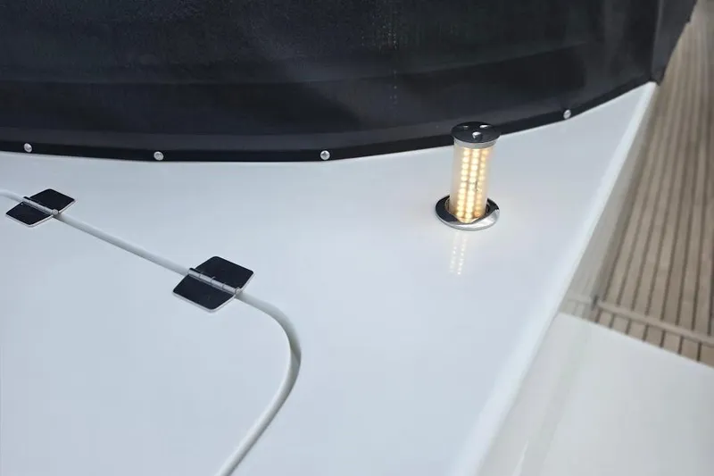 Slide: The Image of 2024 Sirena 58 Flybridge MY yacht deck with LED light detail. - 24