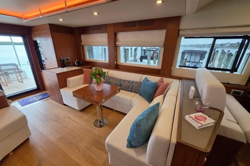 Slide: The Image of Luxurious interior of 2024 Sirena 58 Flybridge MY yacht with elegant seating and decor. - 75