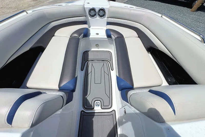 Slide: The Image of 2023 Hurricane SunDeck 2410 OB interior with spacious seating and modern design. - 17