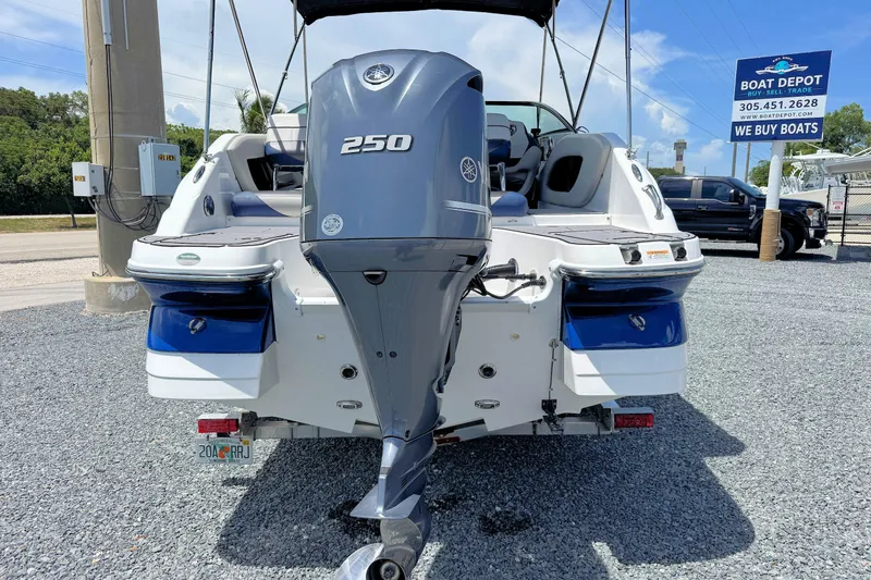 Slide: The Image of 2023 Hurricane SunDeck 2410 OB boat with Yamaha 250 engine at dealership. - 3