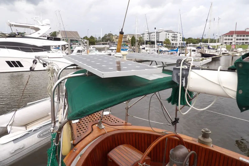 Slide: The Image of Sailboat with solar panels docked at marina, Hans Christian 43 T, 1986 model. - 17