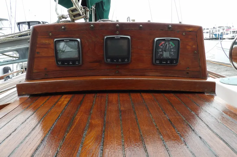 Slide: The Image of Wooden dashboard of 1986 Hans Christian 43 T sailboat with navigation instruments. - 15