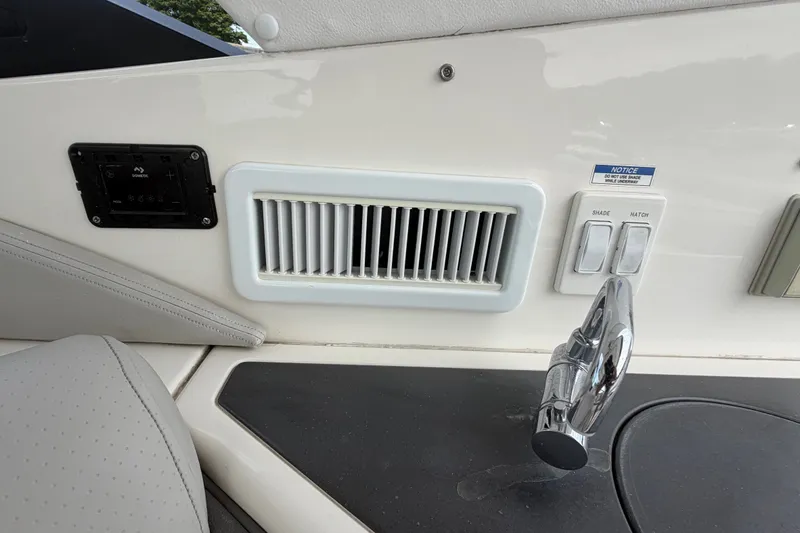 Slide: The Image of Control panel and vent on 2021 Sea Ray Sundancer 320 boat interior. - 22