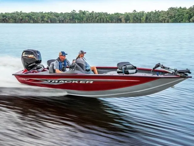 The Image of A red Tracker boat, model Pro Team 175 TXW, speeds across a calm lake. - 1
