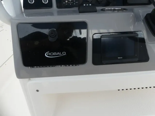 Slide: The Image of The image shows the dashboard of a 2022 Robalo R272 Center Console boat. - 22