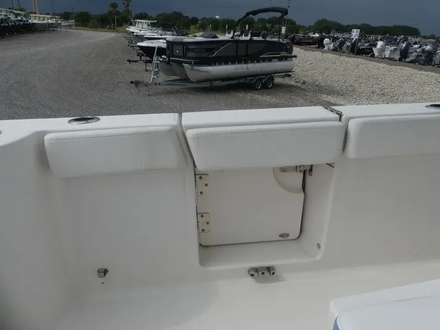Slide: The Image of The image shows the stern of a 2022 Robalo R272 Center Console boat. - 28