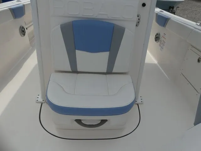 Slide: The Image of A seat on a Robalo R272 Center Console boat, featuring blue and white upholstery. - 14