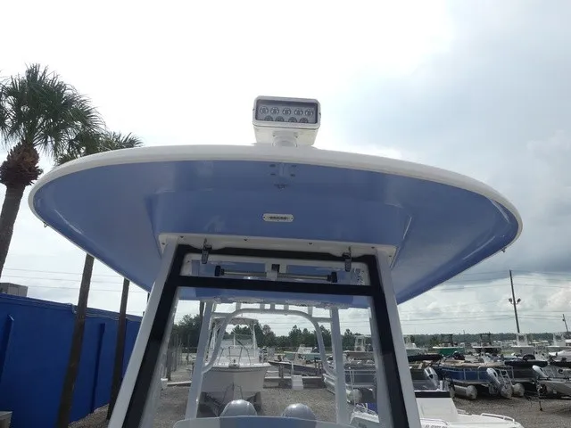 Slide: The Image of The image shows the blue roof of a 2022 Robalo R272 Center Console boat. - 13