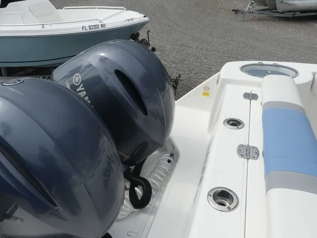 Slide: The Image of Two Yamaha outboard engines are mounted on the stern of a Robalo R272 Center Console boat. - 31