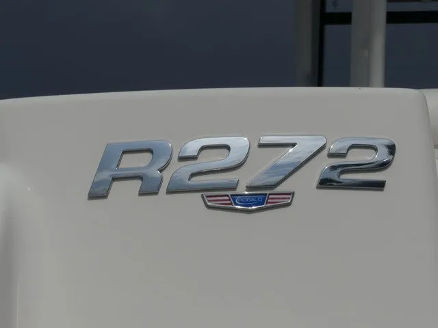 Slide: The Image of Close-up of the R272 logo on a Robalo boat. - 9
